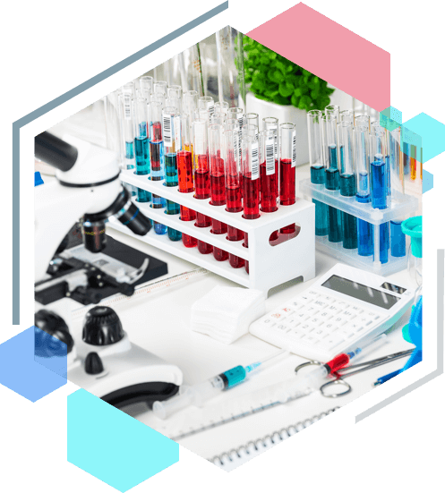 A table topped with lots of lab equipment.